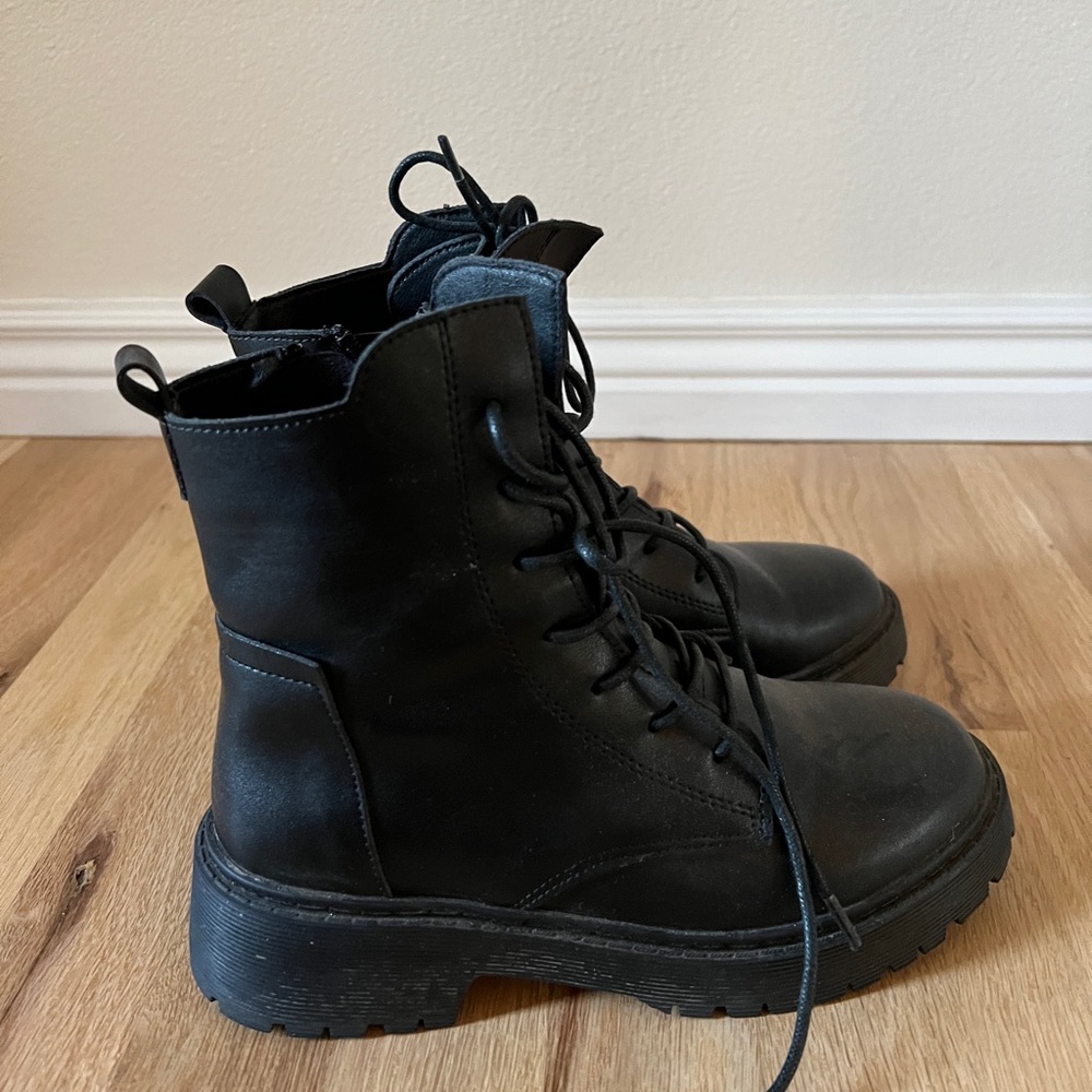 Trendy combat shoes. Very comfortable. Still looks and feel new. Only worn once!